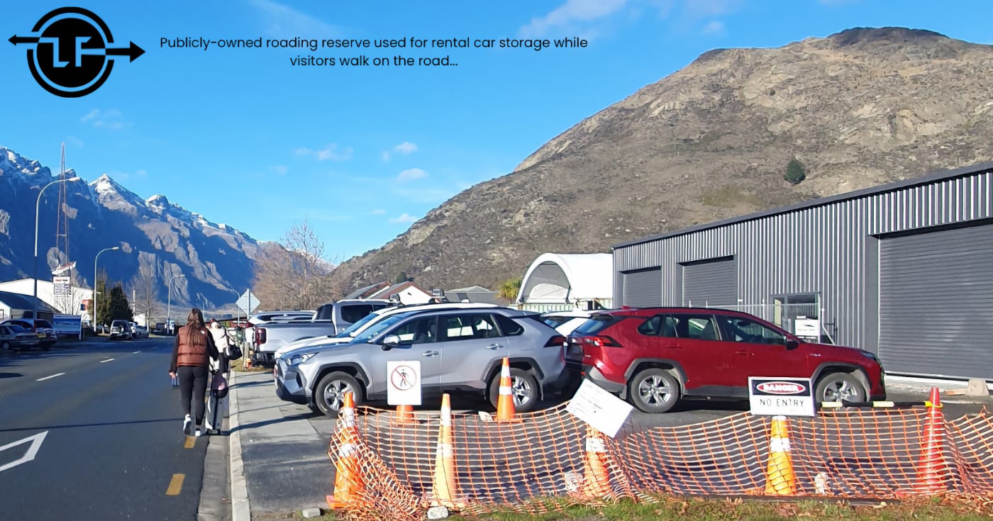 Lightfoot-Publicly-owned roading reserve used for rental car storage while visitors walk on the road...